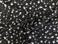 Preview: Baumwolljersey Weiße Farbkleckse auf Schwarz 35 x 150 cm